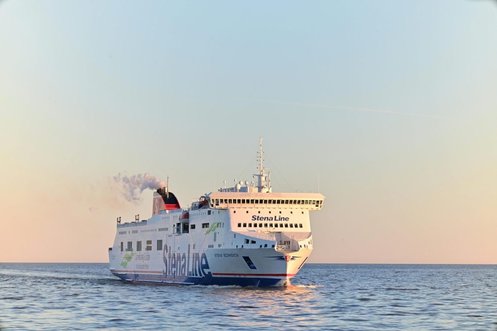 Stena Line ferry sailing in Baltic Sea near Ventspils at sunset.